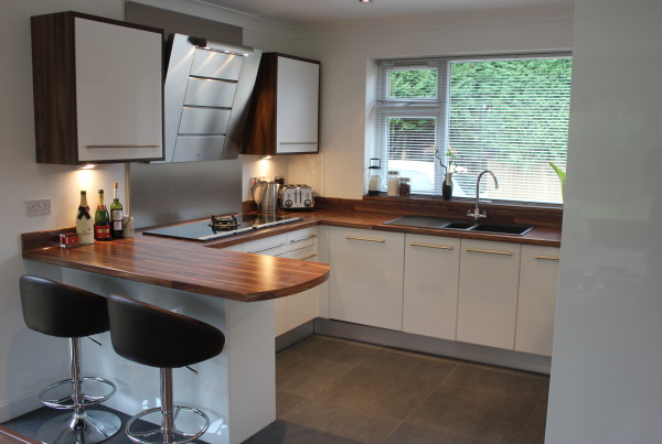 White kitchen with wooden worktops