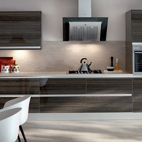 Shiny dark wood panelled kitchen