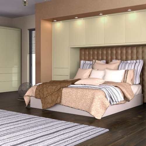 Bedroom with large double bed and stripey rug