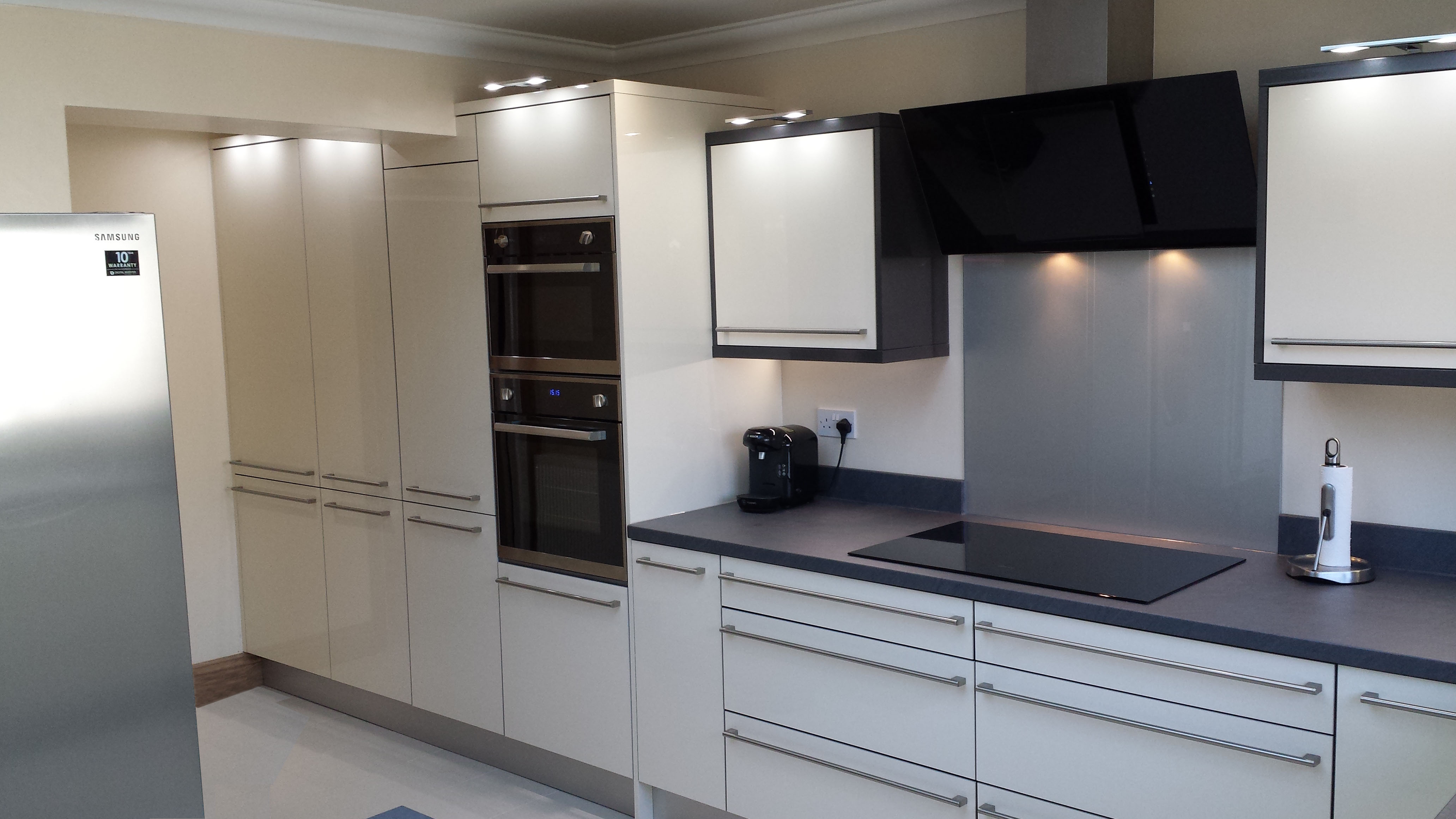 white kitchen with grey worktops