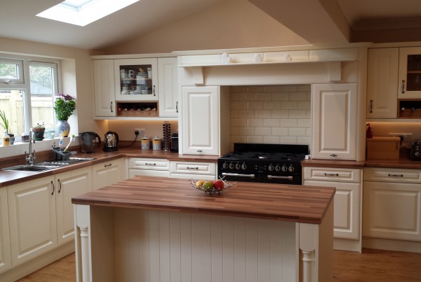 traditional french style kitchen with wooden worktops