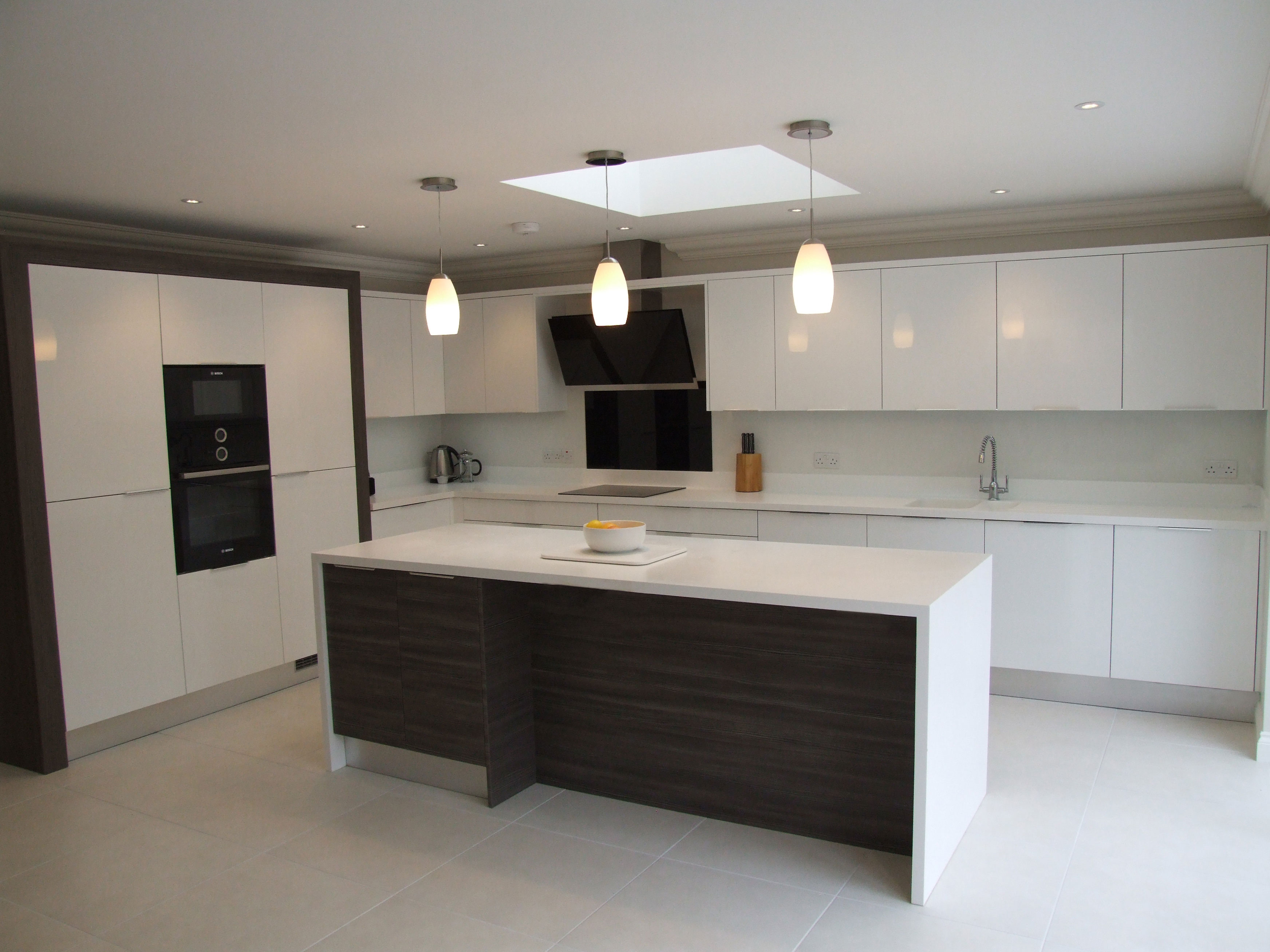 White gloss kitchen with flint grey accent