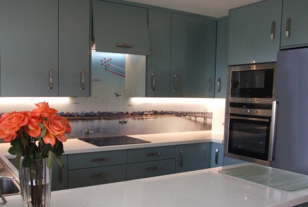 Ice blue kitchen with bespoke glass splashback