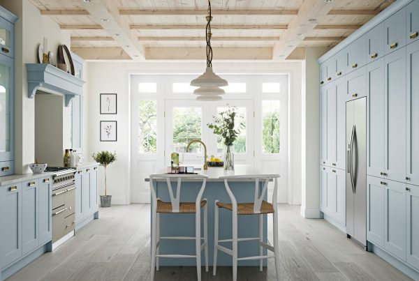 Blue kitchen with white worktops