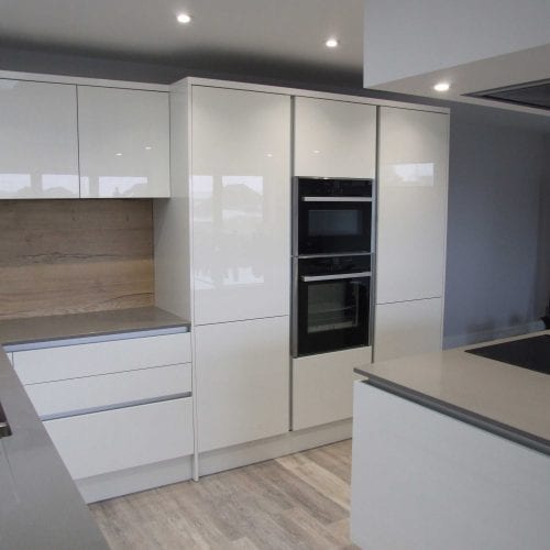 Ultra gloss white handleless kitchen